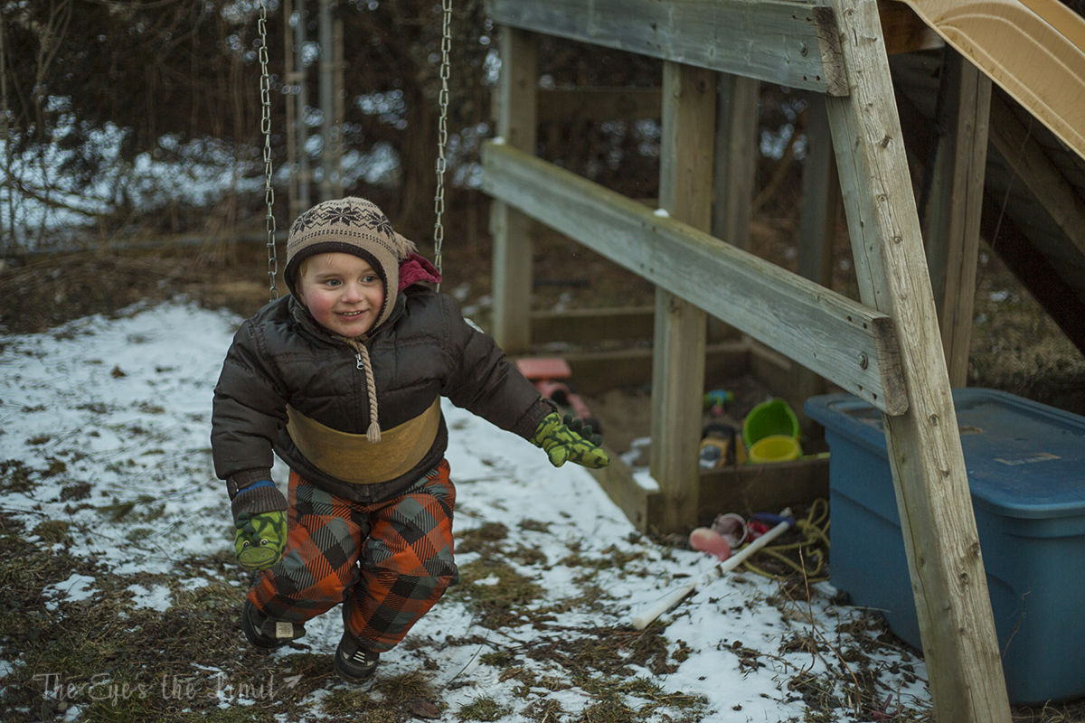 Boy having fun on swing