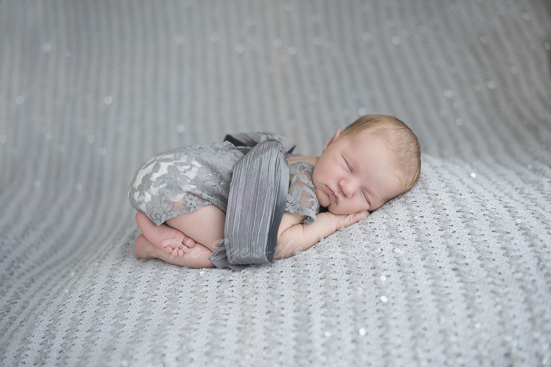 Newborn baby sliver glitter baby girl in grey outfit
