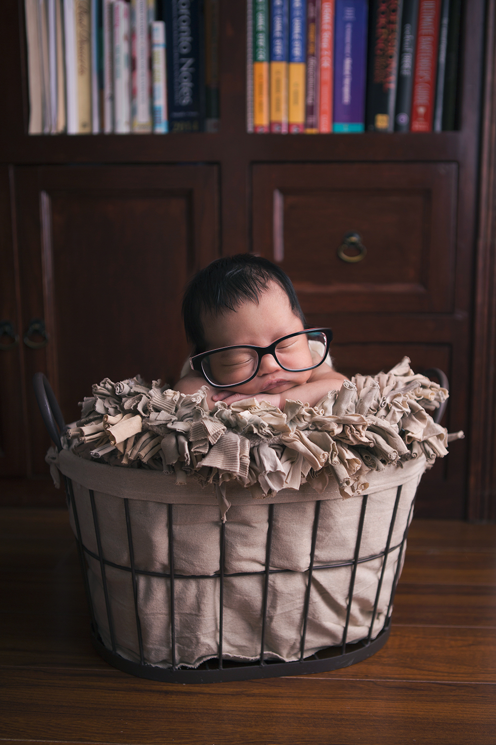Baby Photography featuring newborn in prop
